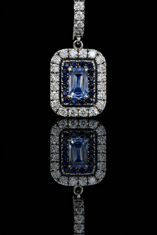 Natural emerald-cut sapphire double halo drop earrings in 14K white gold with 0.78CT G-H SI diamonds – Houston fine jewelry by Endless Diamonds.