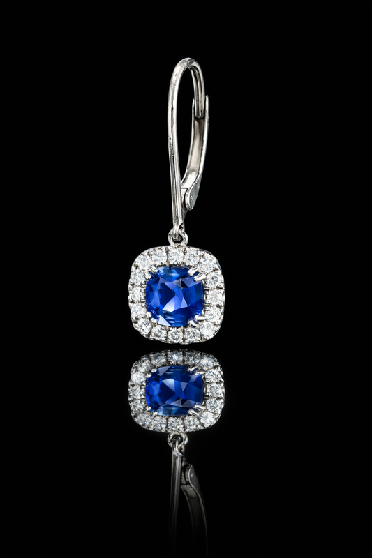 Natural cushion cut sapphire halo drop earrings in 14K white gold with 0.26CT G-H SI diamonds and lever-back closure – Houston fine jewelry by Endless Diamonds.