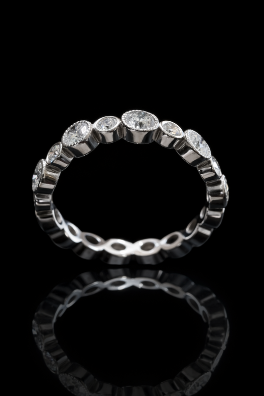 Alternating Bezel Round Diamond Eternity Band in 14K White Gold | 1.30 CT