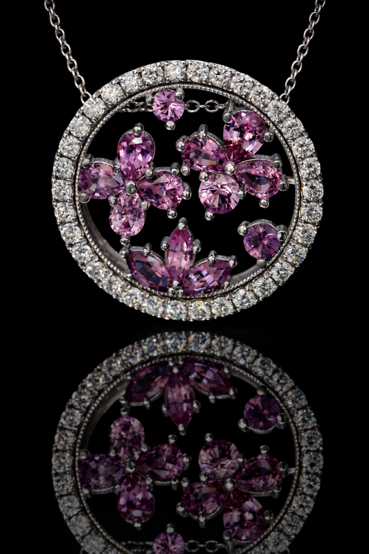 14K white gold pink sapphire floral halo pendant with 0.90 carat sapphires and 0.75 carat G-H SI diamond circle frame