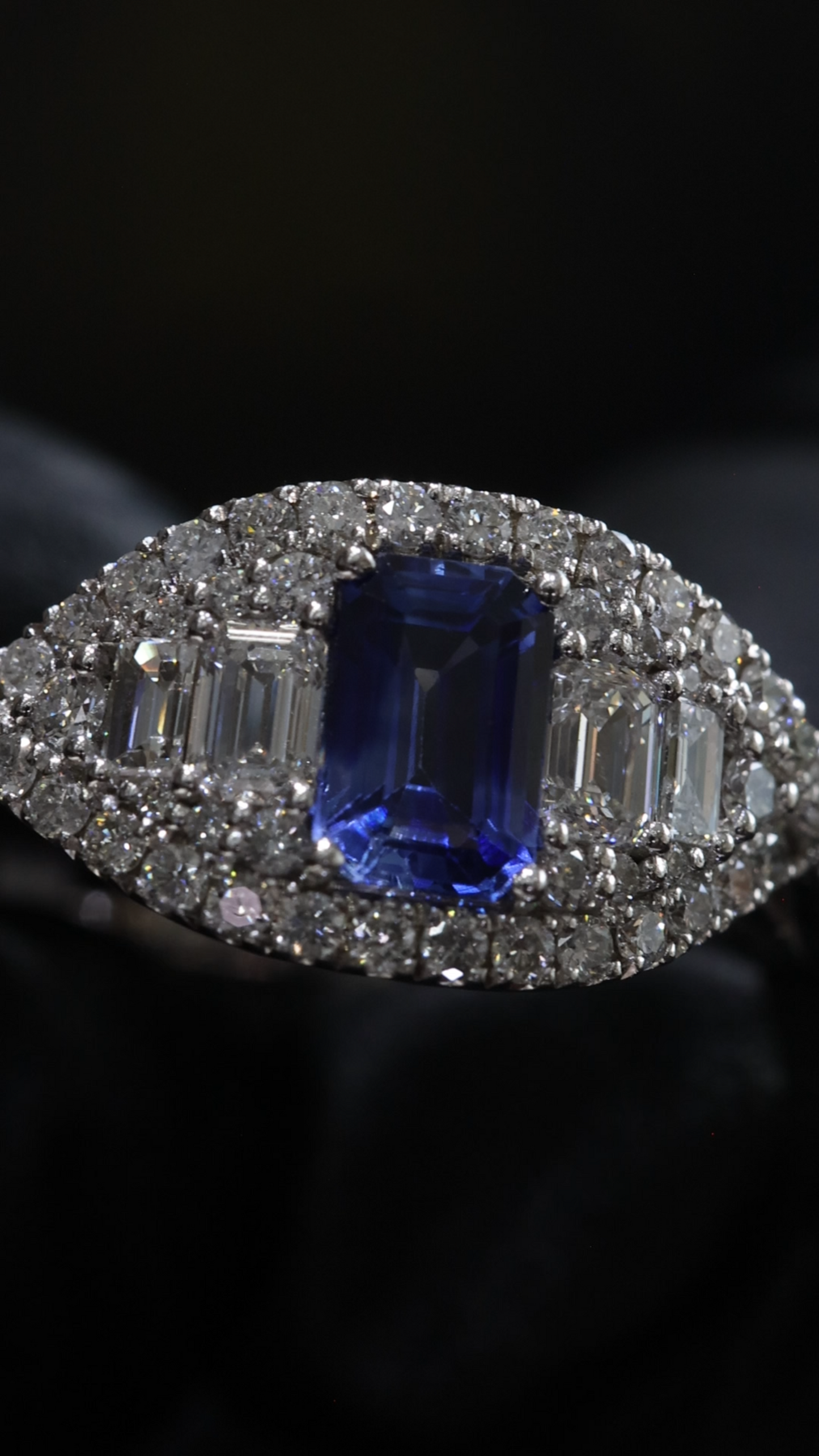Sapphire & Diamond Halo Ring in White Gold | .60 CT Sapphire + .85 CTW Diamonds