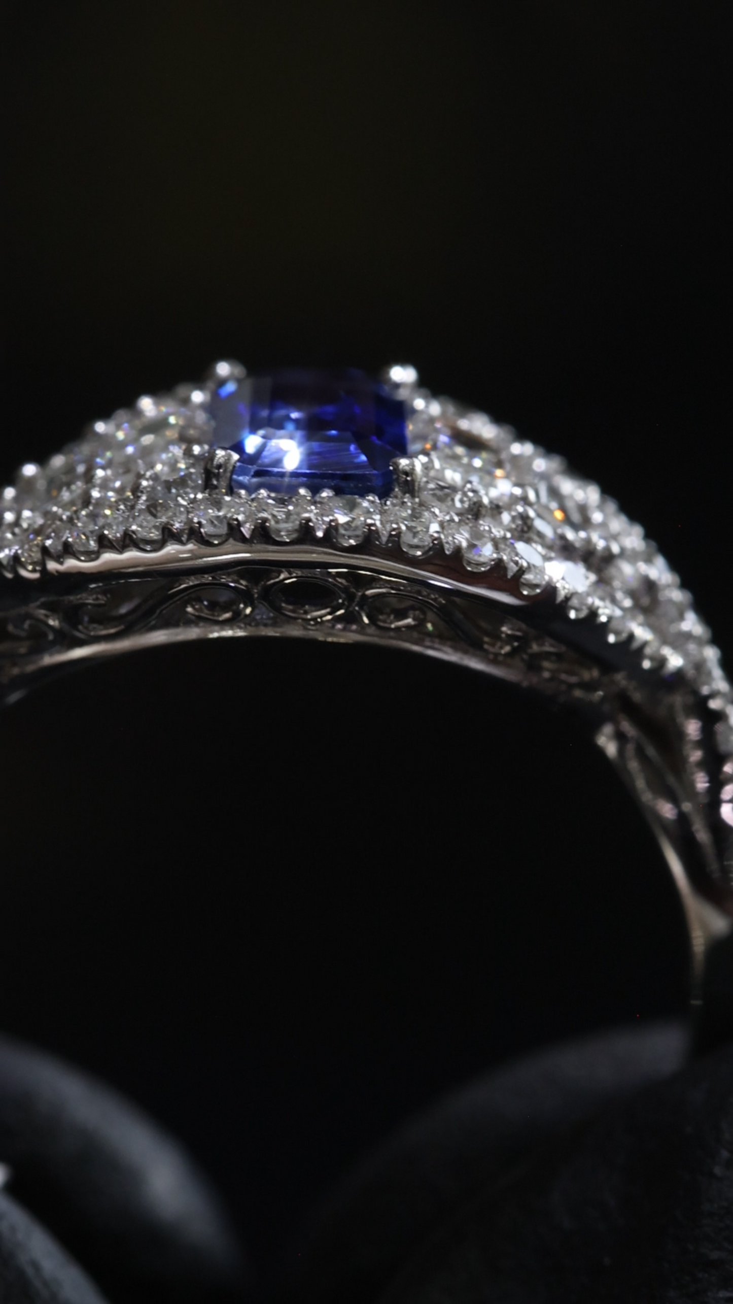 Sapphire & Diamond Halo Ring in White Gold | .60 CT Sapphire + .85 CTW Diamonds